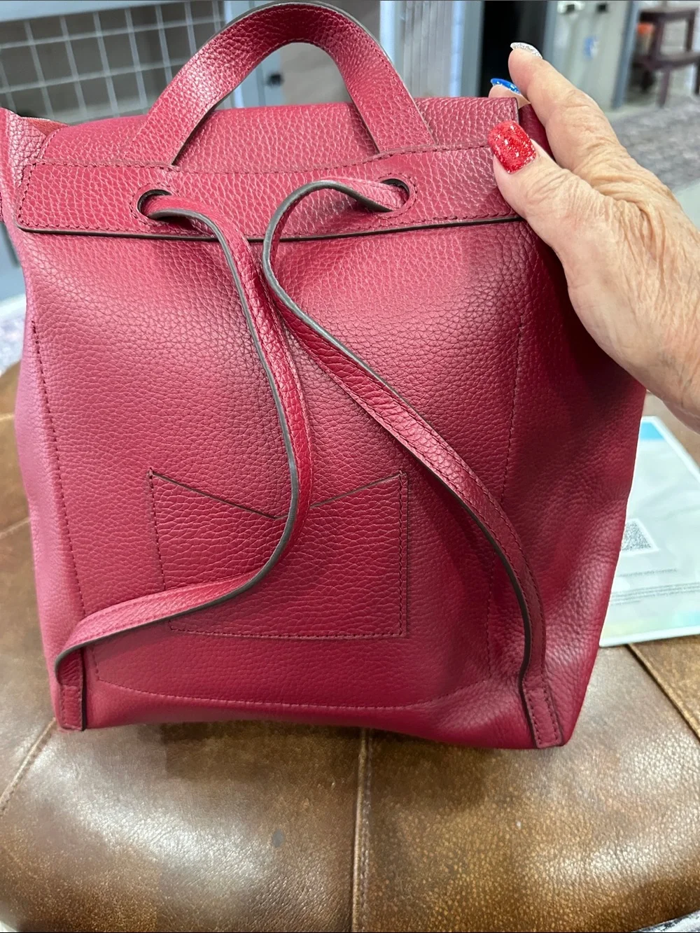 MICHAEL Michael Kors Junie Red Pebbled Leather Drawstring Backpack